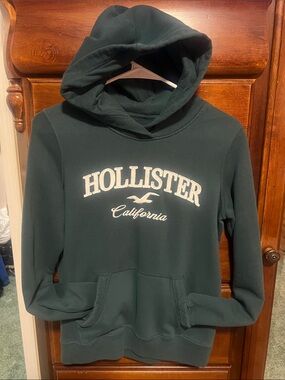 Hollister women’s Hooded Sweatshirt in Deep Teal with White Logo
